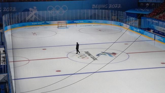 Final preparations at the Wukesong Arena for the ice hockey.