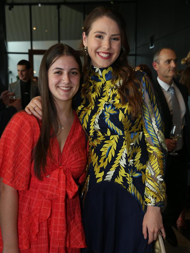 St Joseph’s College 2021 graduation ceremony. Mia Sebastiani and Ruby Morrissy. Picture: Mike Dugdale