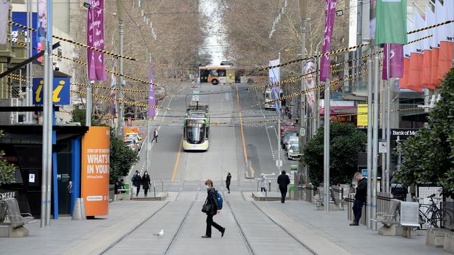 The Bourke St Mall in Melbourne is almost empty as stage three restrictions force people to stay at home. Picture: NCA NewsWire/Andrew Henshaw