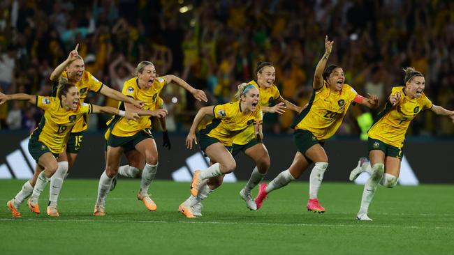 Matildas players celebrate winning the FIFA Womens World Cup Quarter final match against France in a penalty shootout at Brisbane Stadium. Picture Lachie Millard