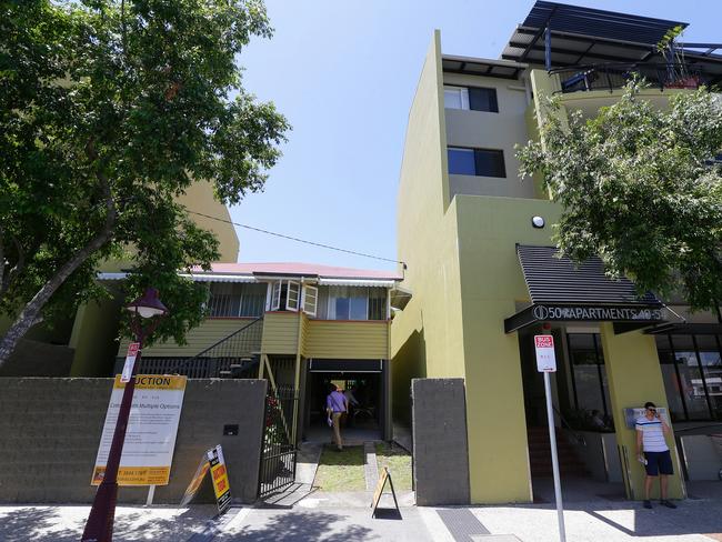 The South Brisbane home has been dwarfed by development on both sides. Picture: Peter Wallis