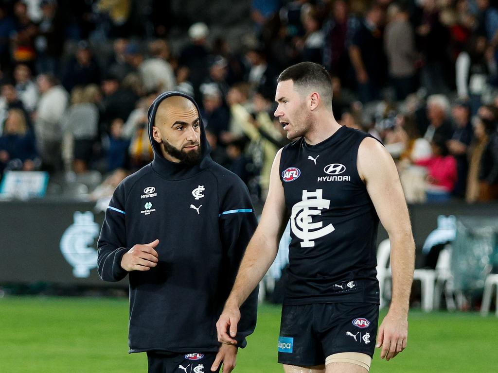 MELBOURNE, AUSTRALIA - APRIL 13: Adam Saad and Mitch McGovern of the Blues are seen during the 2024 AFL Round 05 match between the Carlton Blues and the Adelaide Crows at Marvel Stadium on April 13, 2024 in Melbourne, Australia. (Photo by Dylan Burns/AFL Photos via Getty Images)