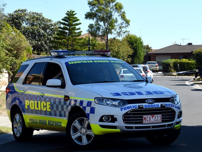 Police at a Meadow Heights property after the raids. Picture: Nicole Garmston