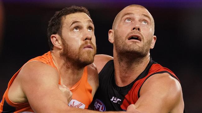 Giants ruckman Shane Mumford (left) will call it quits at the end of 2020, while Tom Bellchambers (right) may be retained on the Essendon list. Picture: Michael Dodge/Getty Images)