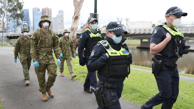 ADF and police patrol along the Yarra in Melbourne. Picture: NCA NewsWire / David Crosling