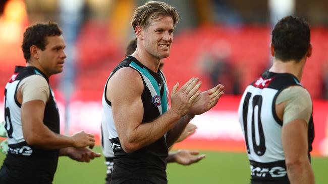 A very happy Port Adelaide skipper, Tom Jonas. Picture: Chris Hyde/Getty Images