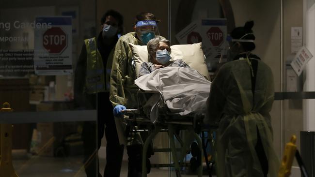 A resident is removed from Epping Gardens aged care facility. Picture: Getty Images