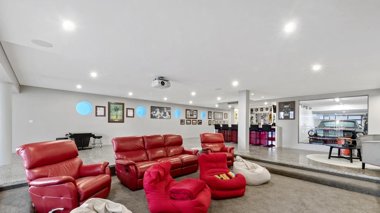 This stunning Kings Beach mansion at 15B Burgess Street is being marketed by Henzells with offers over $7m being sought.