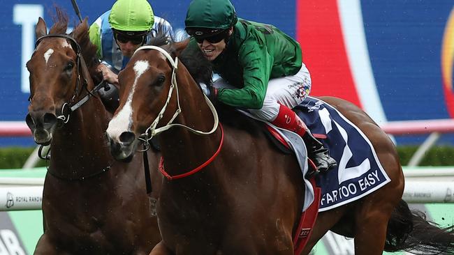 SYDNEY, AUSTRALIA - OCTOBER 19: Craig Williams riding Far Too Easy wins Race 5 The Kosciuszko during Sydney Racing - The Everest Day at Royal Randwick Racecourse on October 19, 2024 in Sydney, Australia. (Photo by Jeremy Ng/Getty Images)