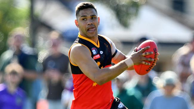 Neville Jetta of the Fitzroy Stars runs with the ball during the 2024 Northern Football Netball League Division 3 Heidelberg Golf Club Seniors Grand Final match between the Fitzroy Stars and the Old Paradians at Lalor Reserve, on September 07, 2024, in Melbourne, Australia. (Photo by Josh Chadwick)