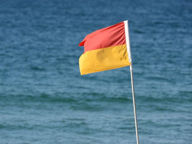 Red and yellow beach flag at Mooloolaba Beach.Photo:Warren Lynam / Sunshine Coast Daily