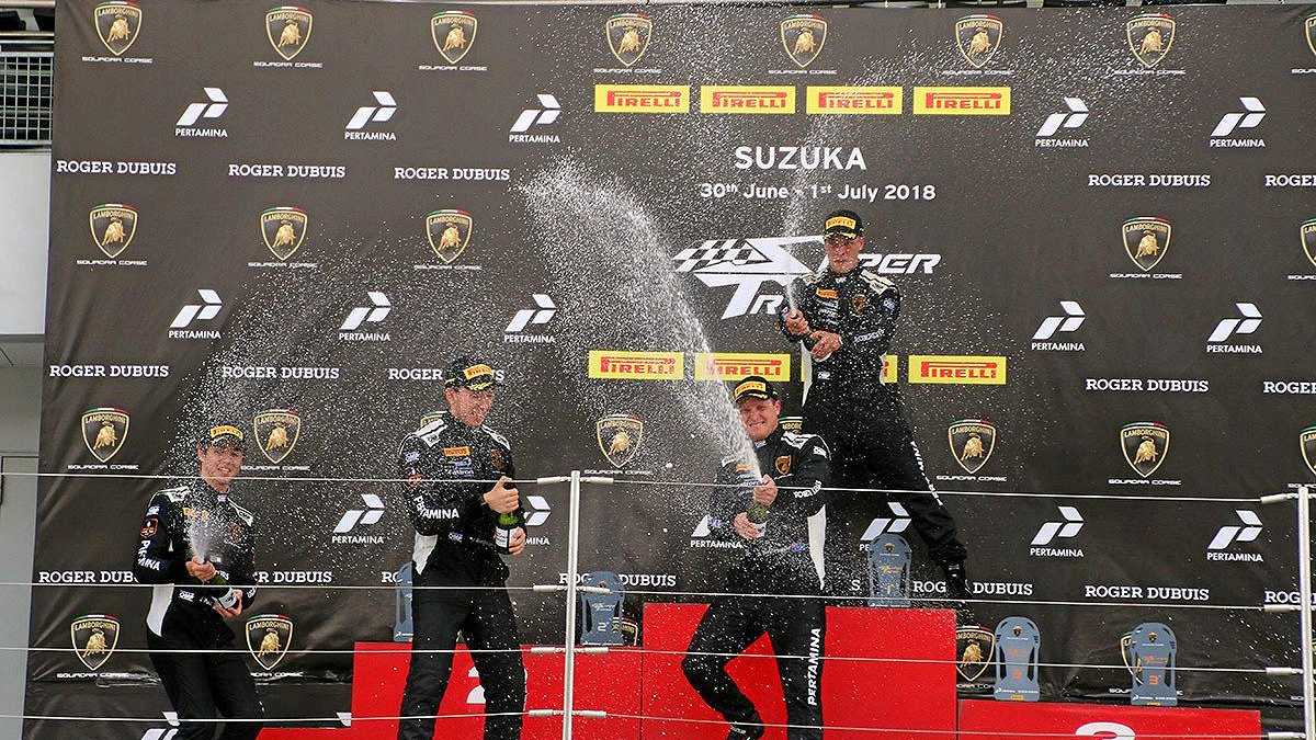 Toowoomba's Ben Gersekowski (bottom right) celebrates his Lamborghini Super Trofeo Asia Championship race win at Japan's Suzuka International Racing Course. Picture: Lamborghini Super Trofeo Asia