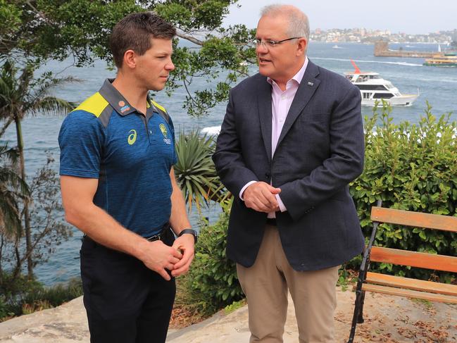 Prime Minister Scott Morrison talks to Tim Paine. Picture: Getty Images