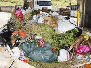 Organic waste is dumped with general waste at the Ballina Shire Council’s waste services facility. The council is aiming to recycle all its organic and green waste when it starts kerbside collections from next July. . Picture: Jerad Williams