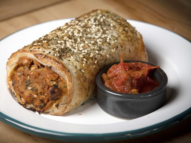 Stabla cafe’s house-made sausage roll which features well-seasoned sausage mince encased in buttery, flaky pastry and a side of housemade tomato relish. Picture Chris Kidd