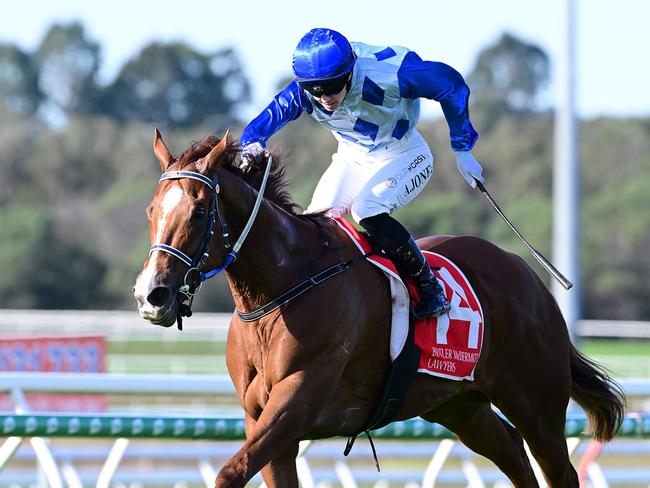 Mission Of Love scoots up the inside to win the Caloundra Cup for jockey Angela Jones and trainers John Symons and Sheila Laxon. Picture: Grant Peters - Trackside Photography.