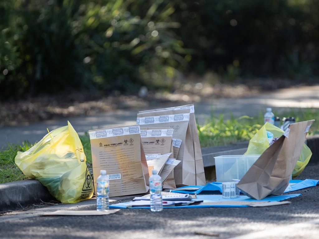 Bags of evidence were collected at the scene on Australis Drive in Ropes Crossing. Picture: Julian Andrews