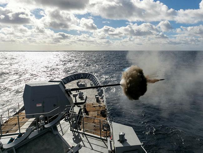 HMAS Ballarat conducts a five-inch gun firing serial, as part of the Anzac class frigate's sea qualifications trials. Picture: LSIS Leo Baumgartner