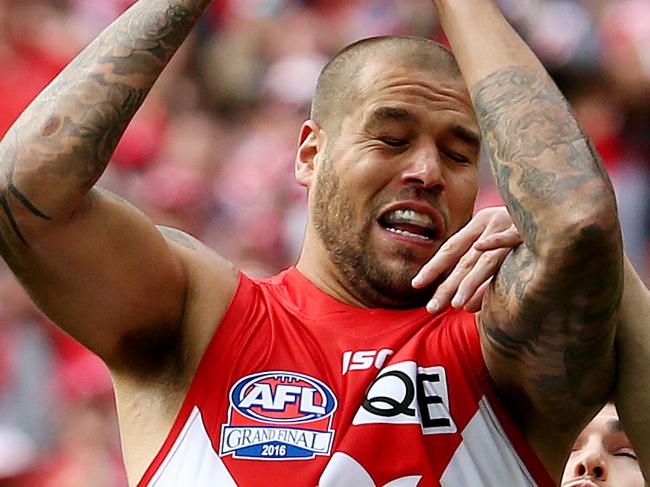 Sydney's Lance Franklin outmarks Western Bulldogs Easton Wood. 2016 AFL Grand Final match between the Western Bulldogs and the Sydney Swans at the Melbourne Cricket Ground (MCG), Melbourne, Australia on October 1, 2016. Picture: Colleen Petch.