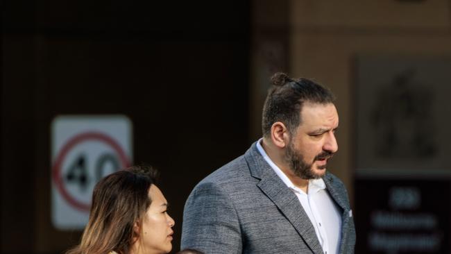 Steven Tabban with his wife and their baby outside the County Court during his plea hearing. Picture: NCA NewsWire / David Geraghty