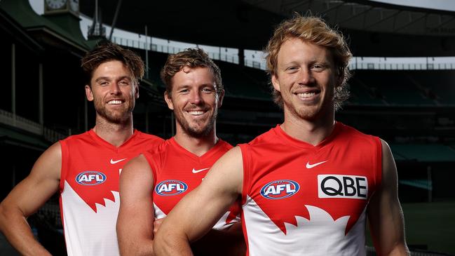 Callum Mills (right) joins Luke Parker (centre) and Dane Rampe as co-captains of the Swans in 2022. Picture: Phil Hillyard