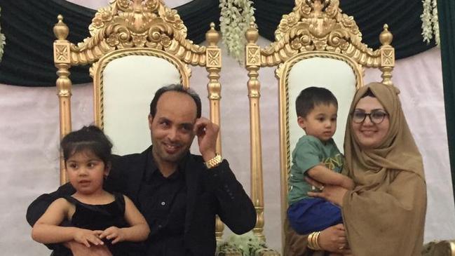 Jawid holding Marwa, aged two, and Nazifa with Hamza at an event in Afghanistan held just over three months ago. Picture: supplied