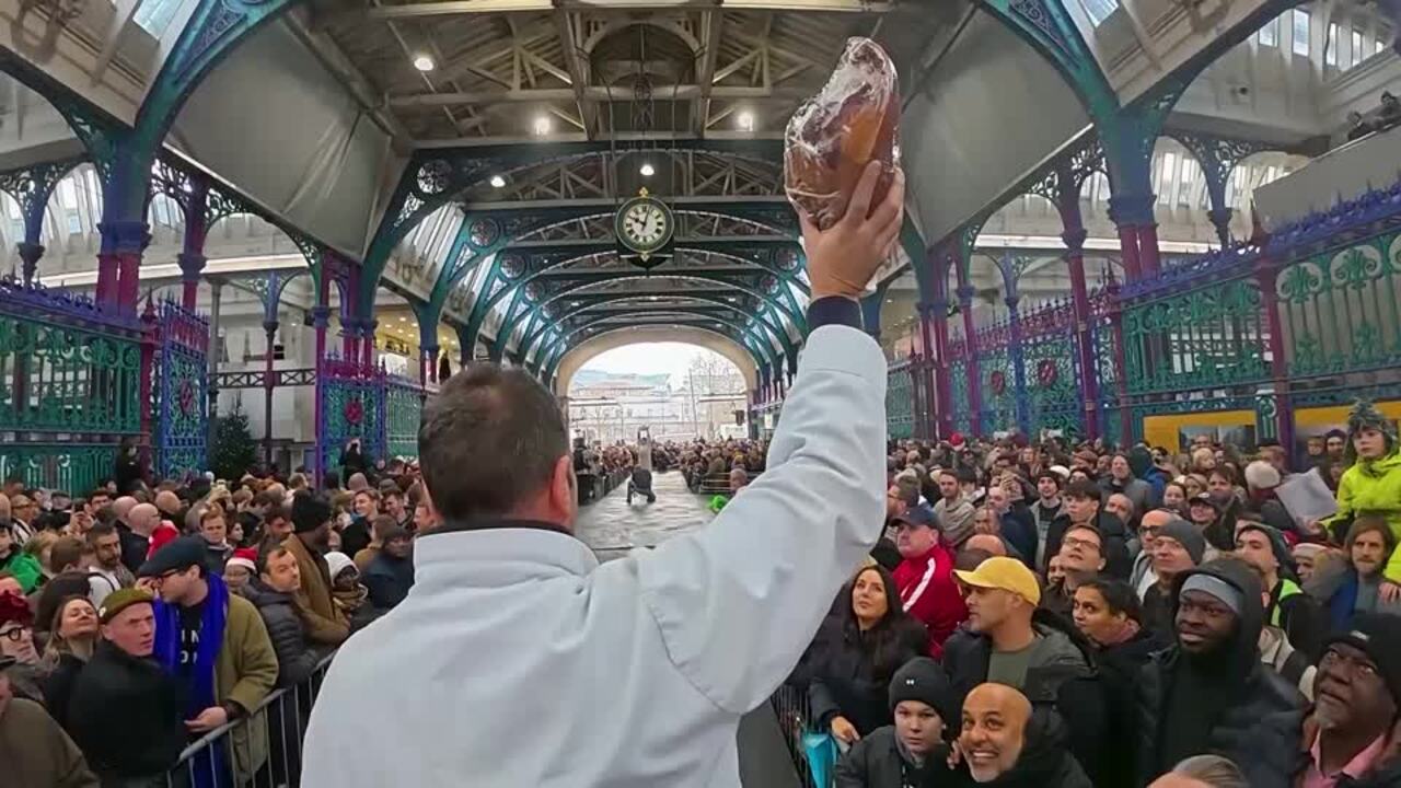 Londoners flock to festive Christmas meat auction