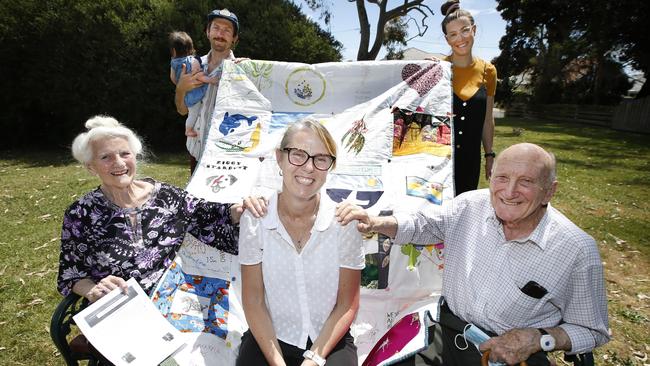 Gabrielle Gordon, centre front, started a neighbourhood newsletter during lockdown and organised the neighbours to make a patchwork quilt telling the story of 2020. Picture: David Caird