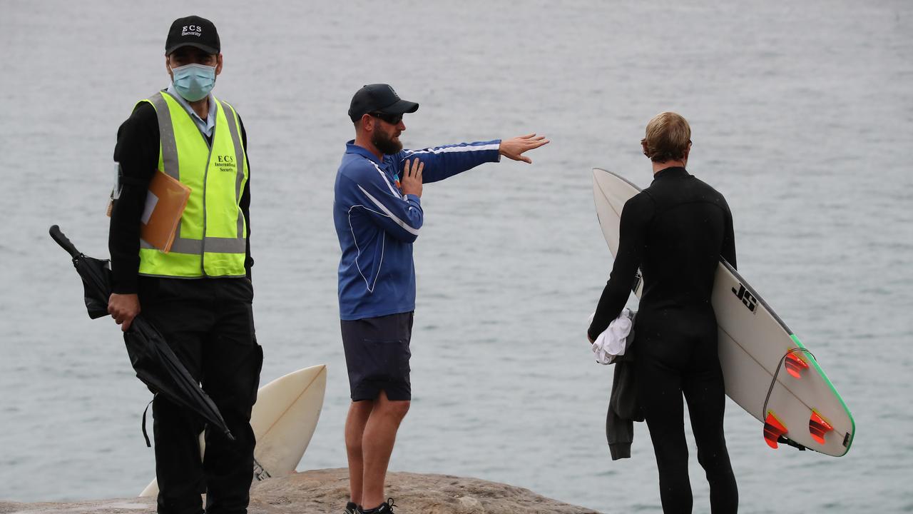 Last week, surfers at Tamarama were seen climbing over fences to go for a surf despite the beach being closed. Picture: David Swift