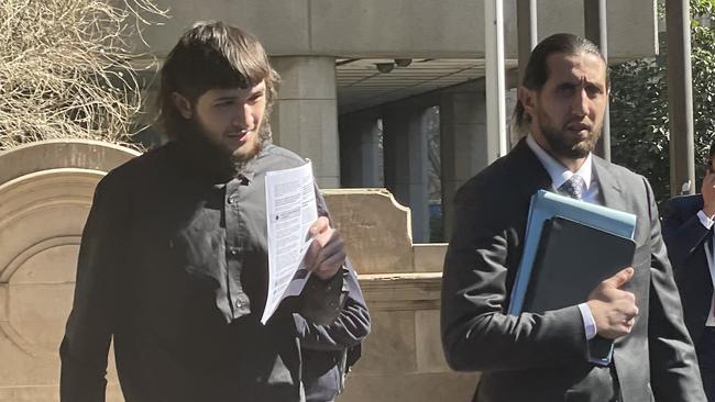 Jordan Maaka left Downing Centre Local Court with his lawyer. Picture: Ashleigh Tullis