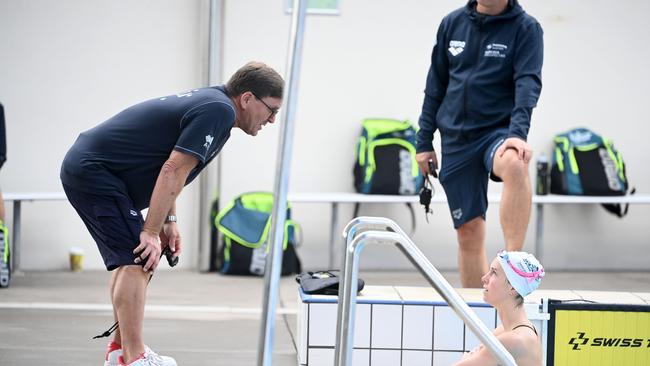 Australian coach Michael Bohl chats to leading gold medal contender Emma McKeon during a training camp in Cairns ahead of the Tokyo Olympic Games. Pic: Delly Carr.