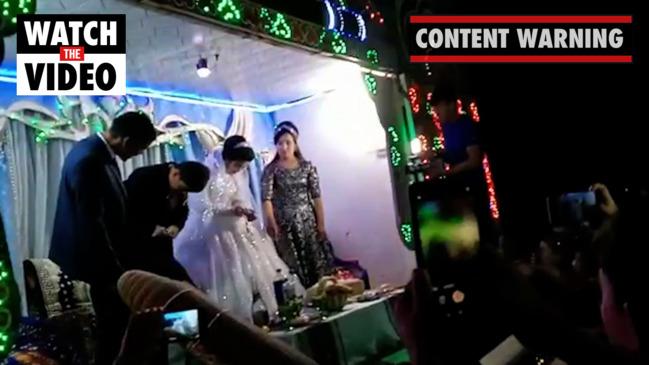 Shocking moment groom beats his new wife at their wedding