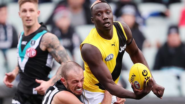 Richmond's Mabior Chol takes on Port Adelaide on the weekend. Picture: Sarah Reed