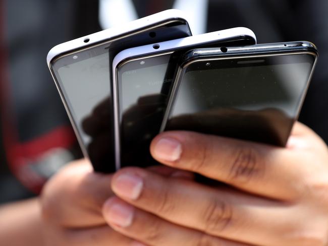 MOUNTAIN VIEW, CALIFORNIA - MAY 07: An attendee holds a stack of the new Google Pixel 3a during the 2019 Google I/O conference at Shoreline Amphitheatre on May 07, 2019 in Mountain View, California. Google CEO Sundar Pichai delivered the opening keynote to kick off the annual Google I/O Conference that runs through May 8.   Justin Sullivan/Getty Images/AFP == FOR NEWSPAPERS, INTERNET, TELCOS & TELEVISION USE ONLY ==