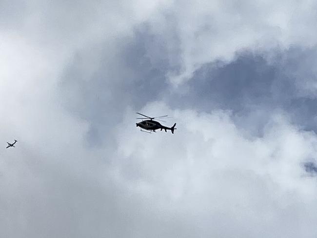 A PolAir helicopter responding to a police pursuit in southwest Sydney on August 23, 2022.