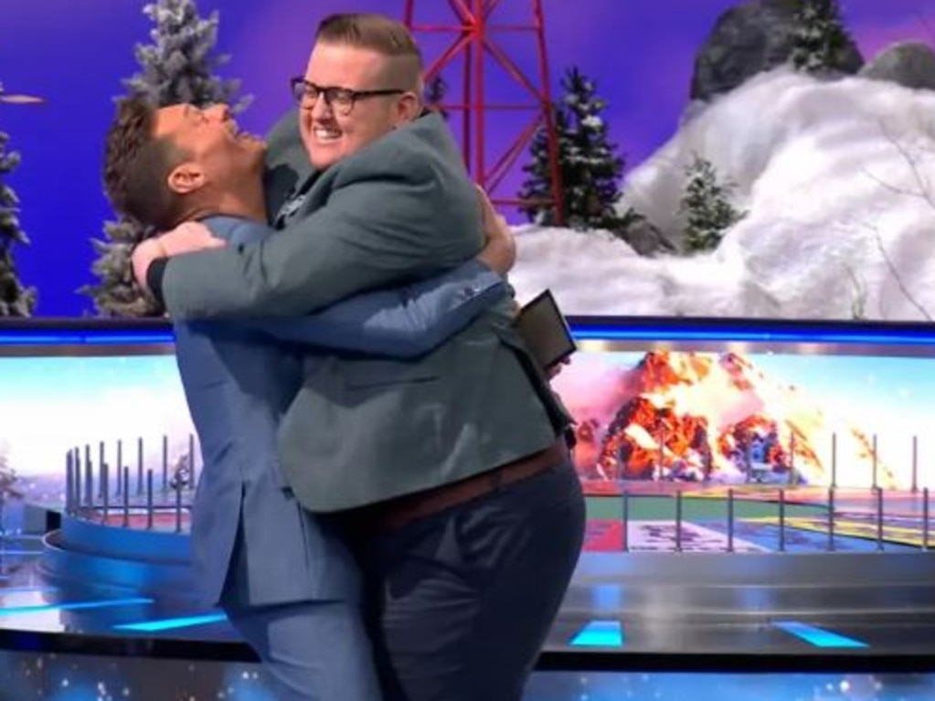 The elated contestant couldn’t control the joy of solving the puzzle and went in to embrace Seacrest with a hug but instead knocked him to the ground. Picture: Wheel Of Fortune / YouTube