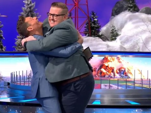 The elated contestant couldn’t control the joy of solving the puzzle and went in to embrace Seacrest with a hug but instead knocked him to the ground. Picture: Wheel Of Fortune / YouTube