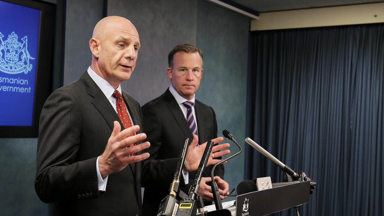 Treasurer Peter Gutwein and Premier Will Hodgman make an announcement regarding poker machine and gambling licenses in Tasmania.