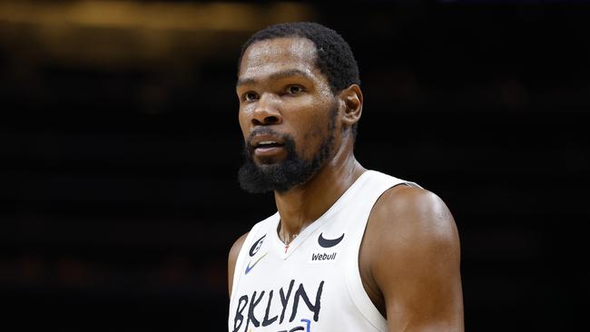 ATLANTA, GA - DECEMBER 28: Kevin Durant #7 of the Brooklyn Nets looks back towards fans after a foul is called against him during the second half against the Atlanta Hawks at State Farm Arena on December 28, 2022 in Atlanta, Georgia. NOTE TO USER: User expressly acknowledges and agrees that, by downloading and or using this photograph, User is consenting to the terms and conditions of the Getty Images License Agreement. (Photo by Todd Kirkland/Getty Images)