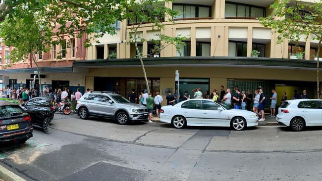 Almost 100 people queue to inspect two apartments for rent above a Surry Hill pub on January 27, 2024. Picture: Jo Seymour,