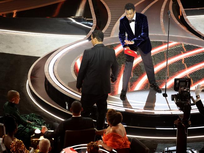 Chris Rock attempting to talk to Will Smith during a commercial break. Picture: Myung Chun/Los Angeles Times via Getty Images