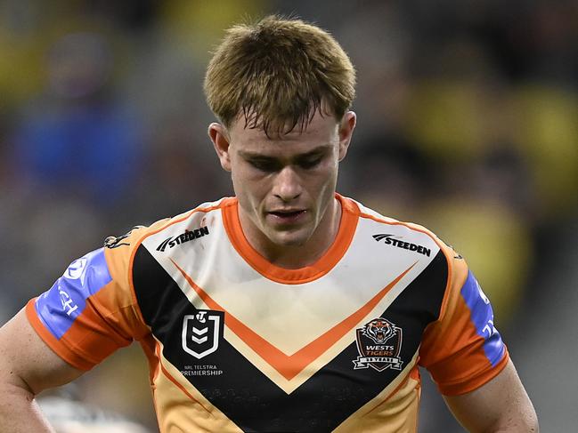 TOWNSVILLE, AUSTRALIA - MAY 24: Lachlan Galvin of the Tigers looks dejected after a Cowboys try during the round 12 NRL match between North Queensland Cowboys and Wests Tigers at Qld Country Bank Stadium, on May 24, 2024, in Townsville, Australia. (Photo by Ian Hitchcock/Getty Images)