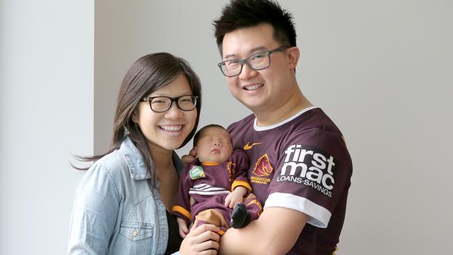 SuperCoach winner Wilfred Zee with new born son Noah and wife Janice. Noah arrived the same day as Wilfred won NRL SuperCoach. Picture: Jono Searle