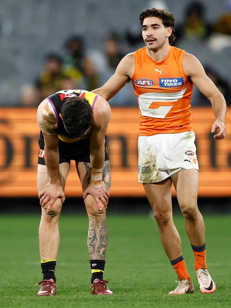 Toby Bedford with Tim Taranto. Photo by Michael Willson/AFL Photos via Getty Images