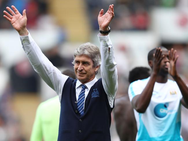 Manuel Pellegrini waves to Manchester City fans in 2016.