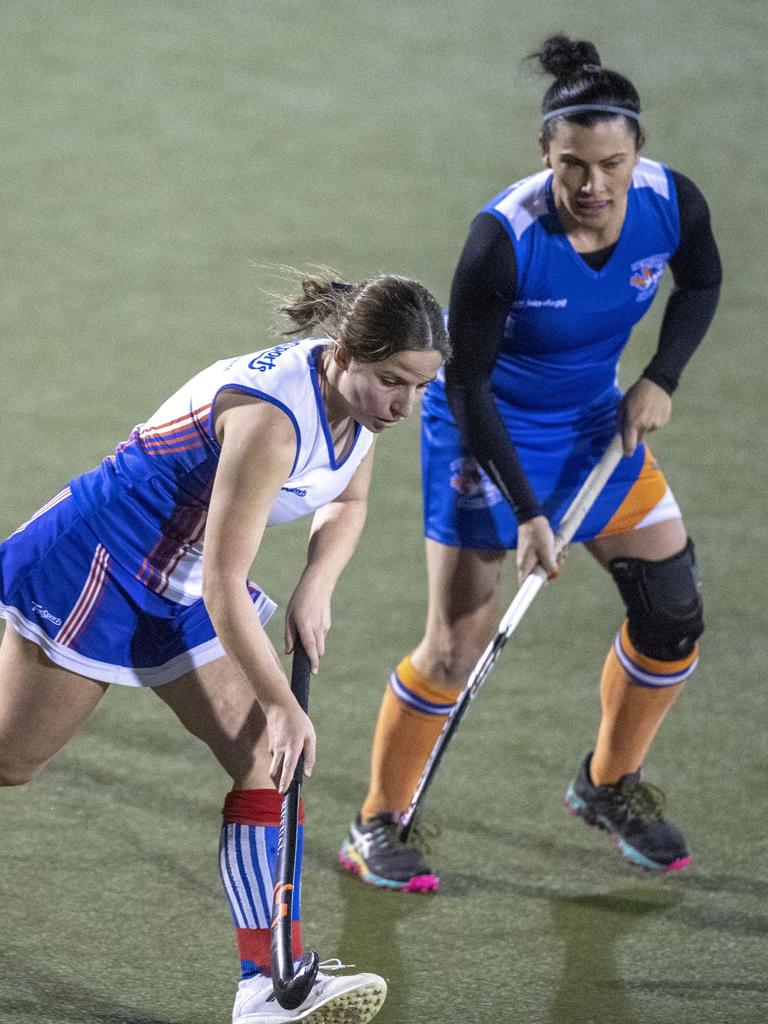 Tannah Hood for Rangeville and Samantha Richards for Newtown. A1 Women , Toowoomba Hockey grand final. Newtown vs Rangeville. Saturday, September 10, 2022. Picture: Nev Madsen.