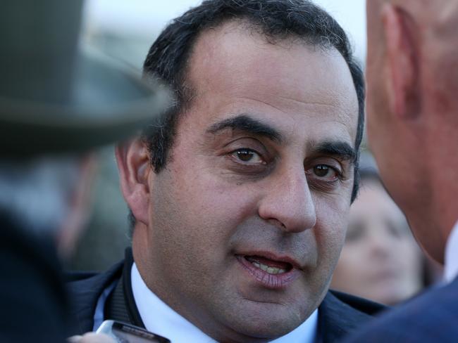 Trainer Saab Hasan is seen after jockey Brad Rawiller rode Sirius Suspect to victory in race 2, Flemington Event Staff Handicap during the Recognition Race Day at Flemington Racecourse in Melbourne, Saturday, July 20, 2019. (AAP Image/George Salpigtidis) NO ARCHIVING, EDITORIAL USE ONLY