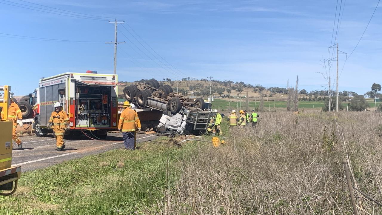 A man died after his semi-trailer rolled at East Greenmount, on the New England Highway.