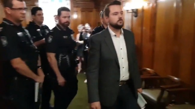 Labor Leader escorted from City Hall by police