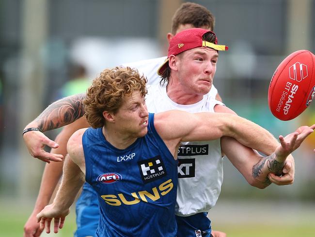 Matt Rowell and Bailey Humphrey during a Gold Coast Suns AFL pre-season training session. Picture: Chris Hyde/Getty Images.